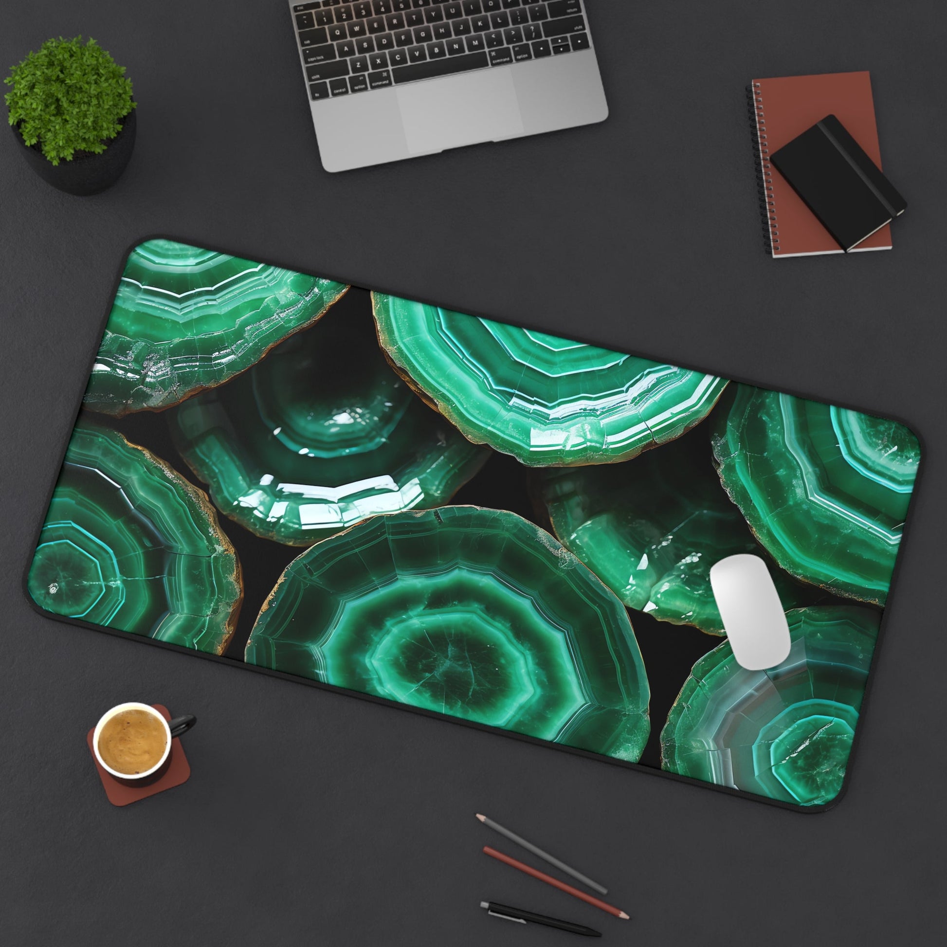 Deep Green, Emerald Crystal Geode xxl mouse pad of size 15 by 31 inches displayed on a desk