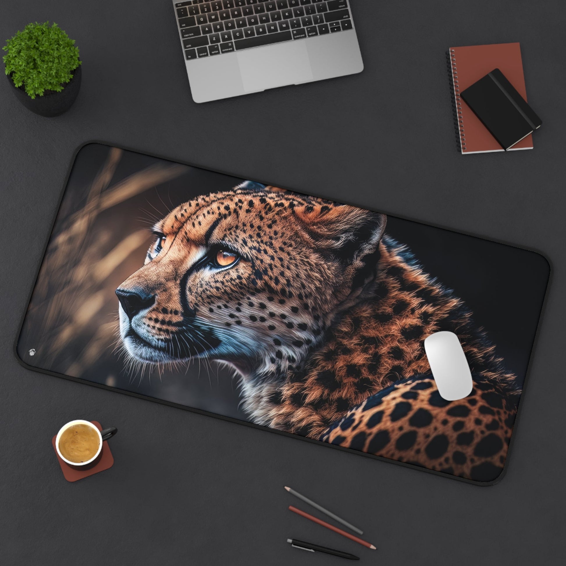 Exotic Cheetah Pattern xxl mouse pad of size 15 by 31 inches displayed on a desk